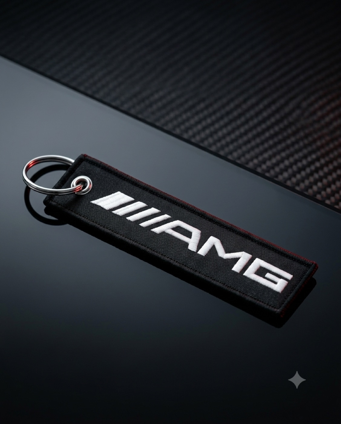 Llavero AMG Racing sobre fibra de carbono